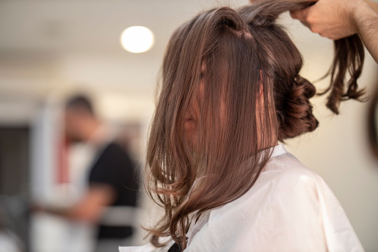 hair styled by hairstylist in a modern salon - SERVICE